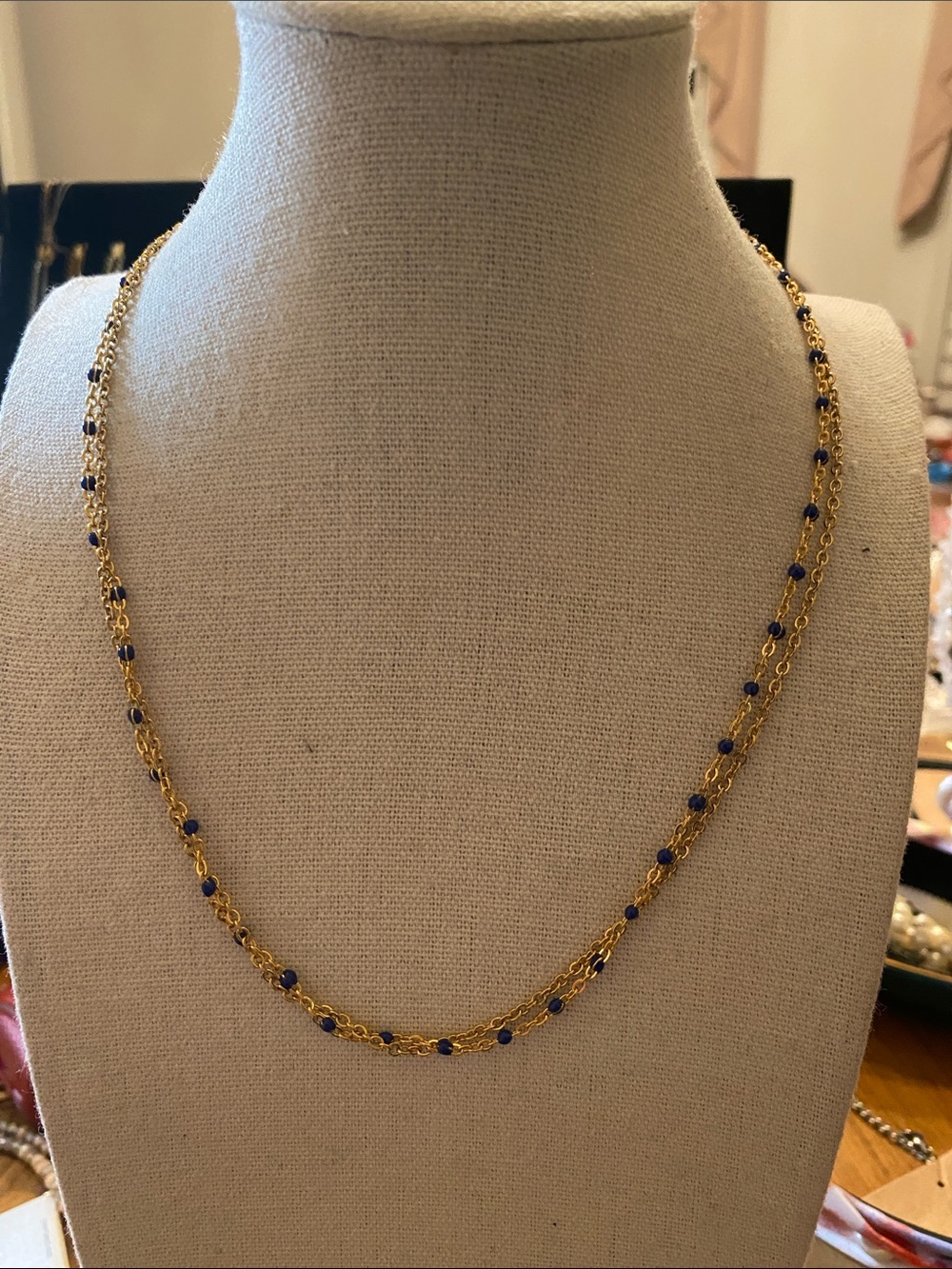 Plunder gold necklace with blue beads